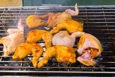 Close-up of meat on barbecue grill