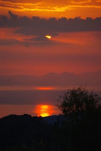 Scenic view of dramatic sky during sunset