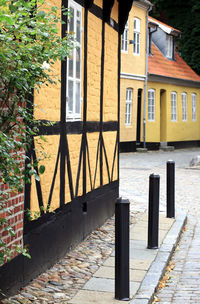 Footpath by building in city