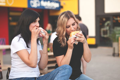 Young woman eating food