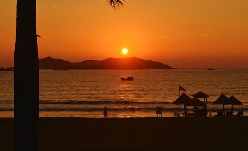 Scenic view of sea at sunset