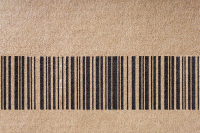 Barcode symbol on cardboard, modern simple flat barcode on carton paper