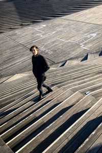 High angle view of man standing on floor