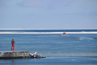 Winter frozen sea against sky