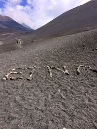 Scenic view of volcano etna against sky