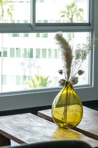 Close-up of hourglass on table
