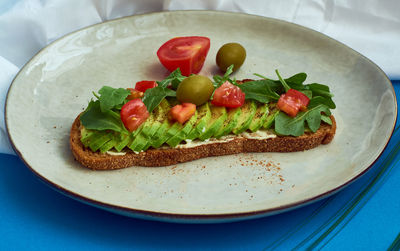 Close-up of breakfast served in plate