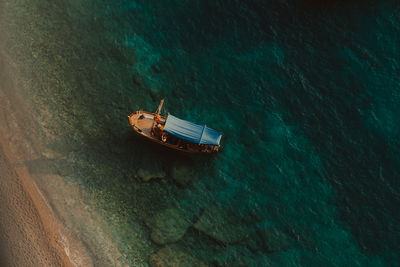 High angle view of sailboat sailing on sea