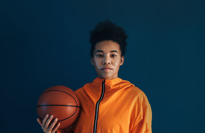 Young man playing basketball