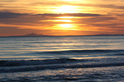 Scenic view of sunset over sea