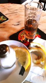 High angle view of beer in glass on table