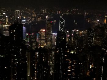 Illuminated buildings in city at night