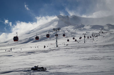 Scenic view of snow covered mountain against sky