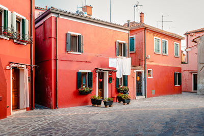 Typical red burano dwellings with cloths laid out