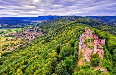 High angle view of trees and buildings against sky