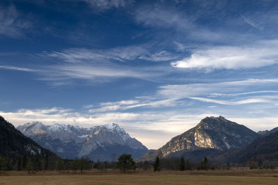 Scenic view of snowcapped mountains against sky