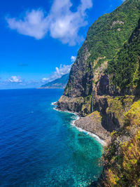 Scenic view of sea against sky. madeira views, living the best tropical island live.