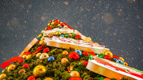 Multi colored christmas tree in winter