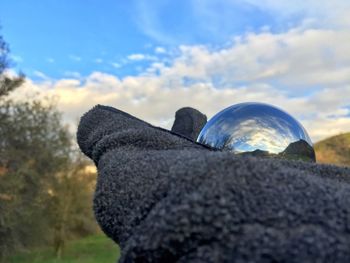 Close-up of object against blue sky