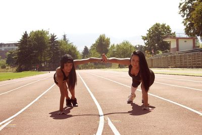 Portrait of women on running track