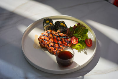 Close-up of food in plate on table