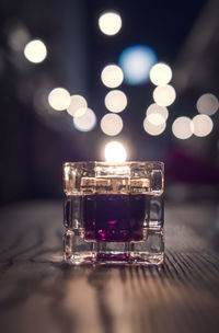 Close-up of wine glass on table