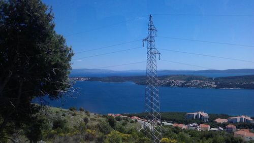 Scenic view of sea against blue sky