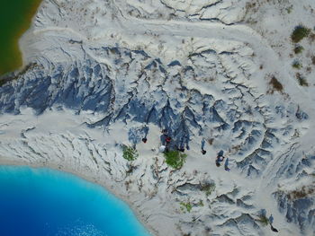 High angle view of people in snow