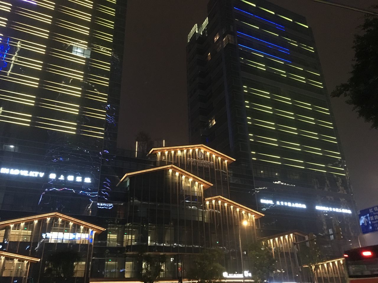 illuminated, architecture, built structure, building exterior, night, city, building, low angle view, office building exterior, office, modern, tall - high, skyscraper, no people, outdoors, tower, lighting equipment, nature, glowing, city life, financial district