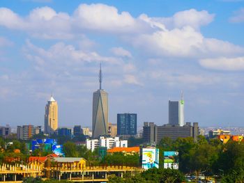 Modern buildings in city against sky