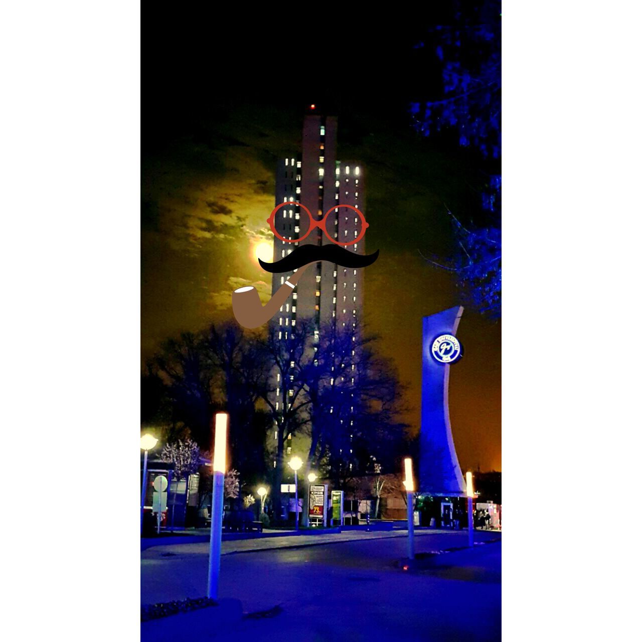 illuminated, night, building exterior, built structure, architecture, transfer print, city, communication, auto post production filter, lighting equipment, tree, text, outdoors, building, street, sky, city life, light - natural phenomenon, western script, sign