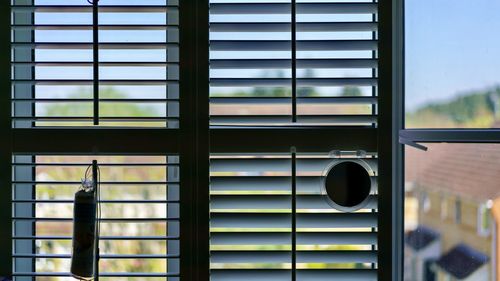 Reflection of building on glass window