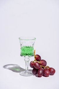 Close-up of drink against white background