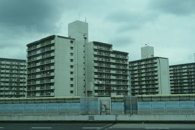 Low angle view of modern buildings against sky