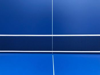 Full frame shot blue tennis court 