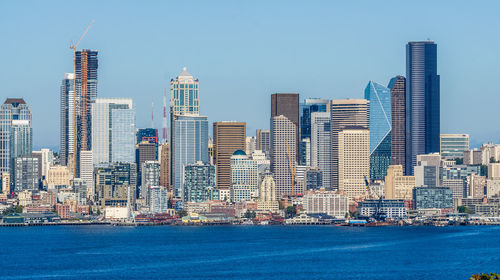 A view of the seattle skyline from a park in west seattle, washington.