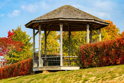 Gazebo in park against sky during autumn