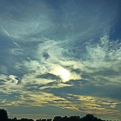 Sun shining through clouds