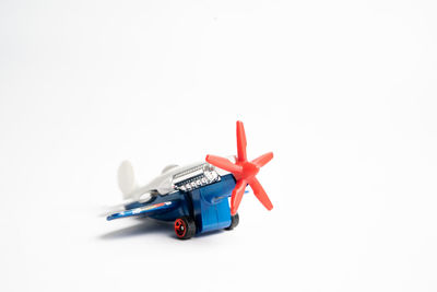 Close-up of toy car against white background