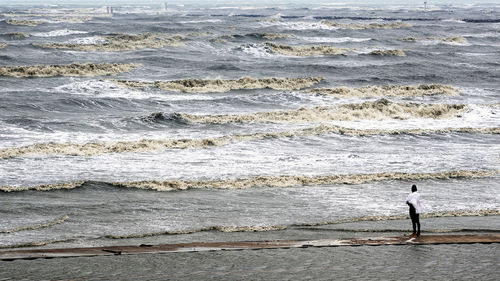 Man standing on beach