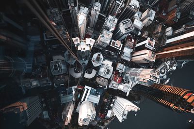 High angle view of illuminated buildings in city at night