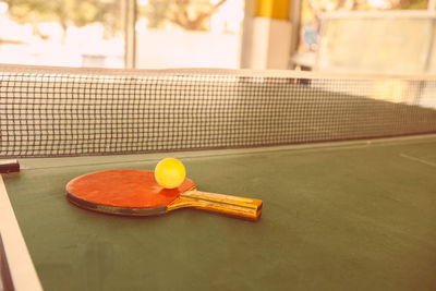 High angle view of table tennis racket on table