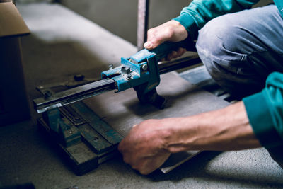 Man working on metal