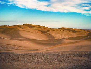 Scenic view of desert against sky