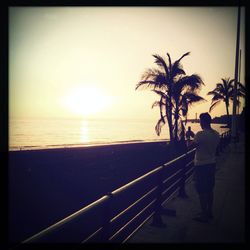 Scenic view of sea at sunset