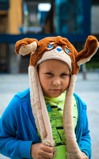 A portrait ofa boy suspecting face and cute hat