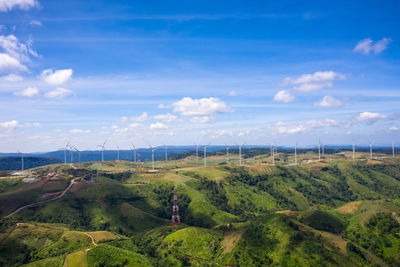 Scenic view of landscape view win turbine energy electric plants 