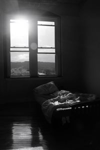 Man sleeping on bed at home