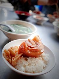 Close-up of rice in bowl on table