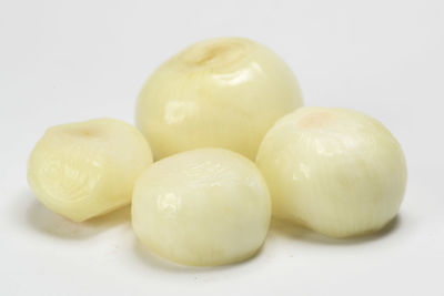 Close-up of fruits over white background